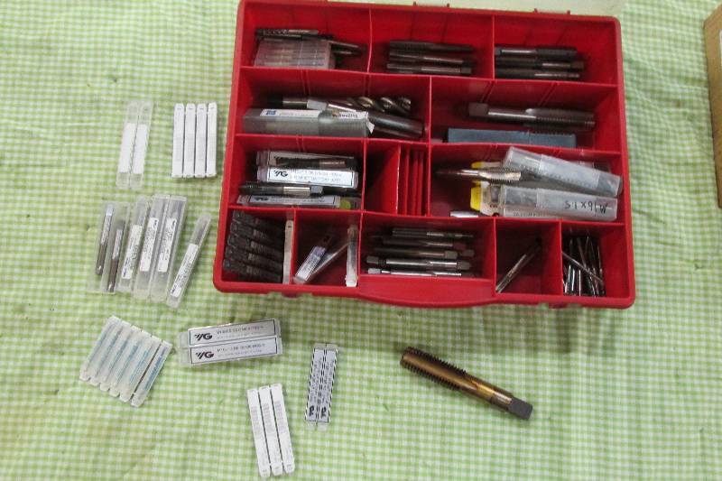 Red plastic organizer filled with t...