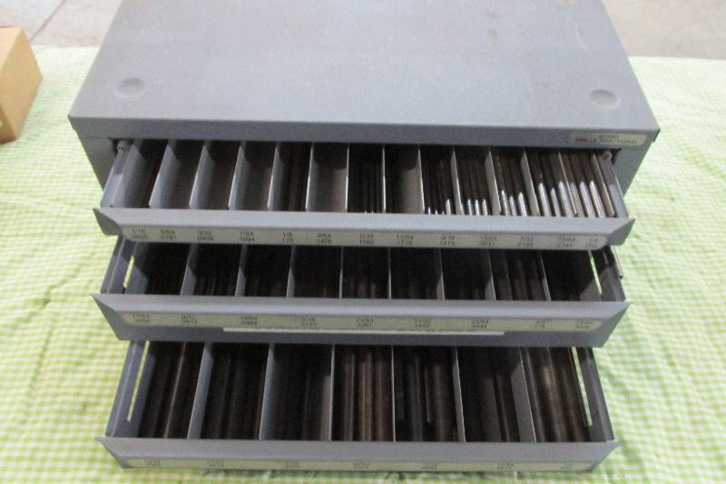 Metal bin filled with transfer punc...