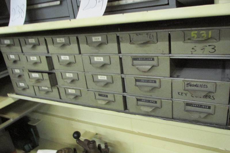 Tool box filled with bits, taps, co...