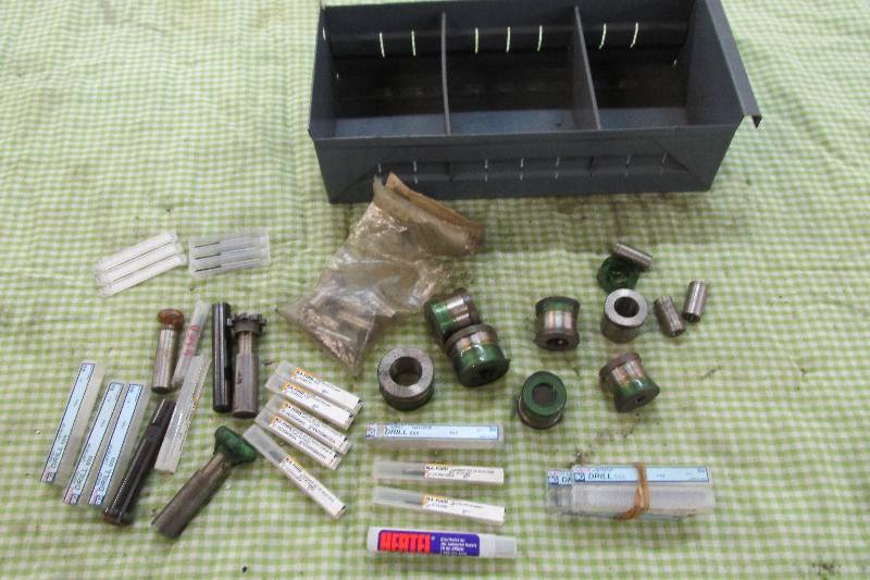 Lot of die buttons and drilling sup...