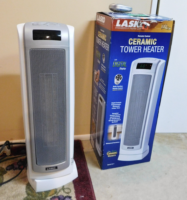 lot 24 image: Lasko ceramic tower heater with remote control