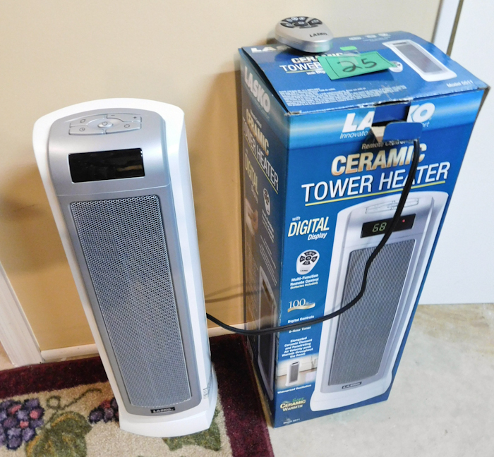 lot 25 image: Lasko ceramic tower heater with remote control