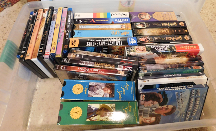 lot 35 image: lot of DVD and VHS movies see photos for titles and numbers