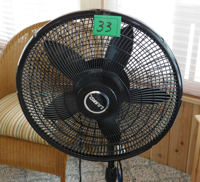 lot 33 image: Lasko tall pedestal fan in good working order clean