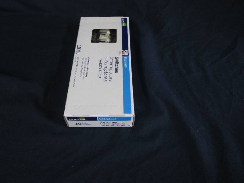 lot 72 image: Light switches - Brand New - Lot of 10 - Almond in color