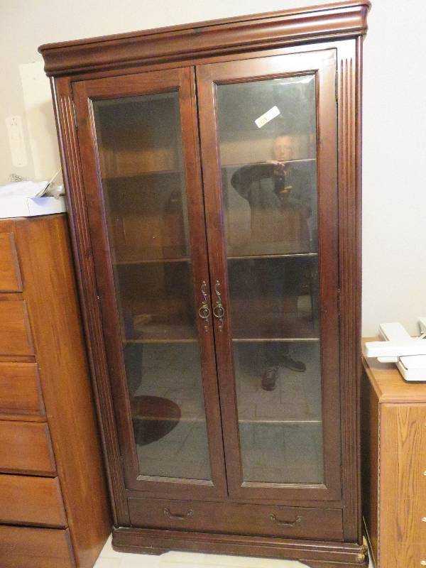 Vintage beveled glass display cabinet